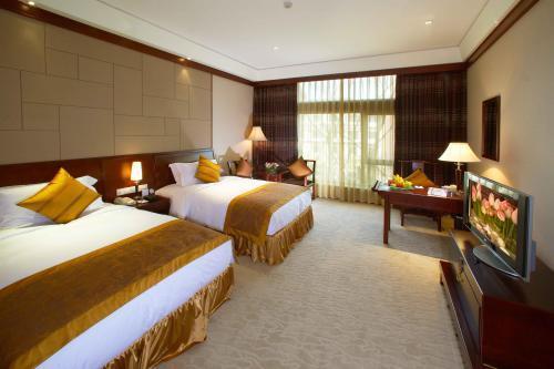 Crowne Plaza Hangzhou Xanadu Resort Rom bilde